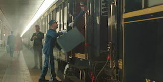 venice simplon-orient-express train at a platform